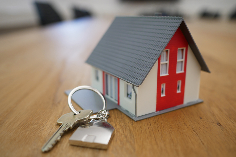 photo of little house and housekey