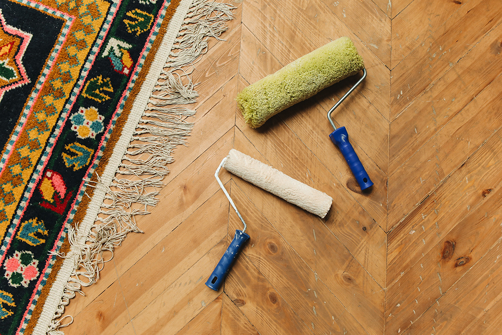 photo of paint rollers and rug